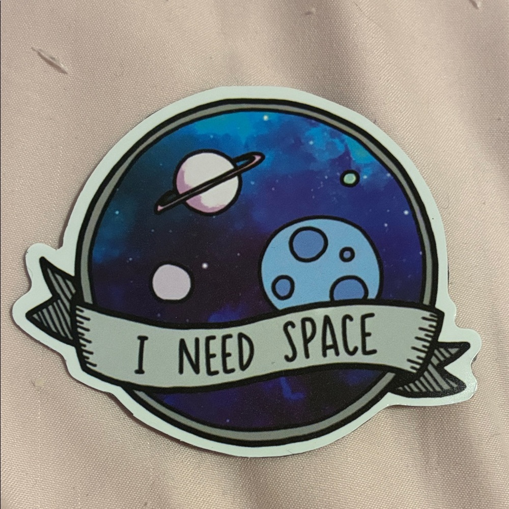Space-Themed Magnet with Blue and Purple Design